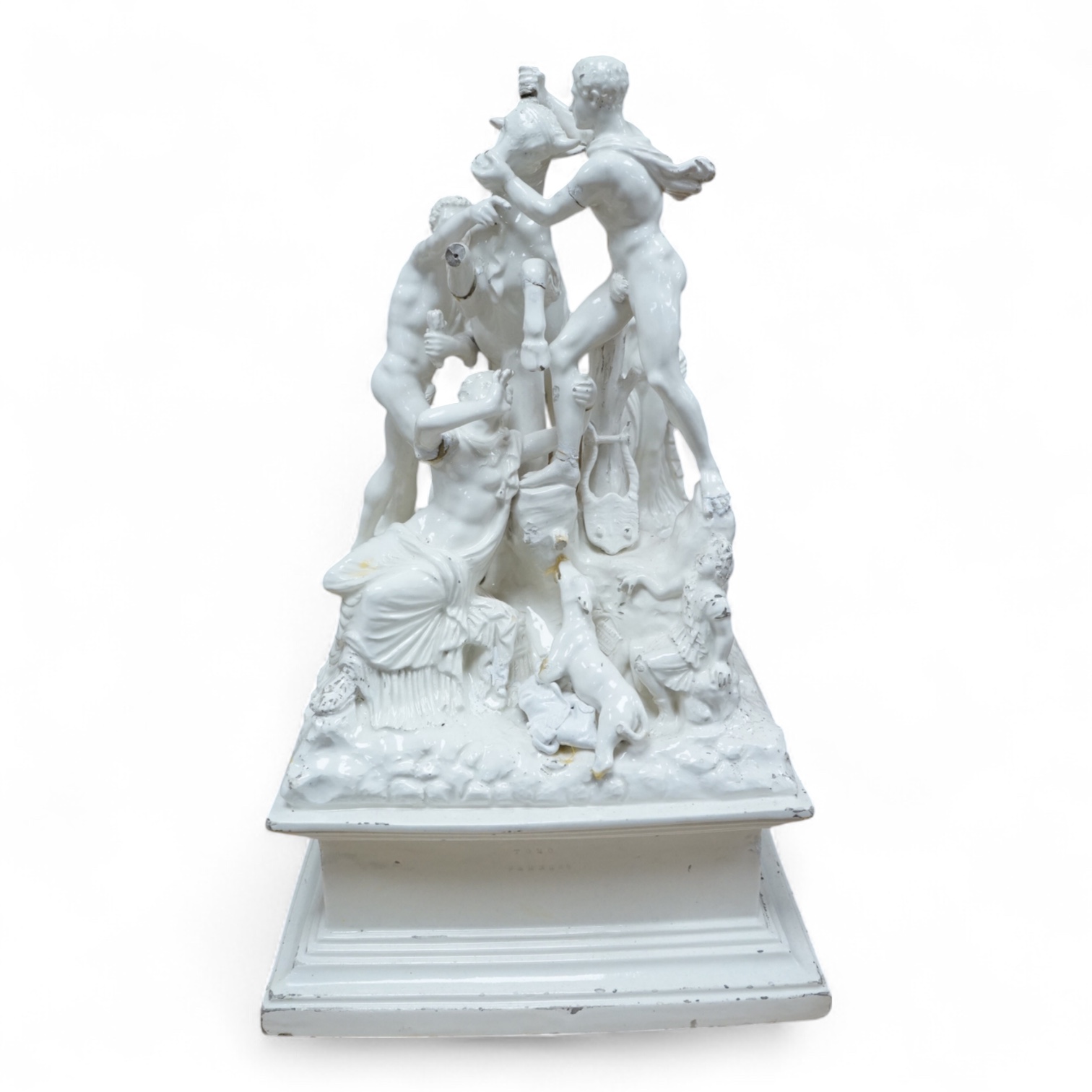 A 19th century Naples tin glazed pottery group of figures wrestling a Europa and the bull, 14in.